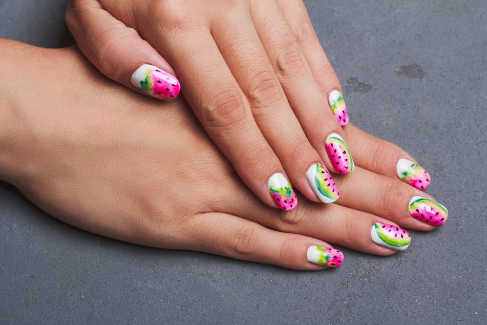 Watermelon nail art on gray background