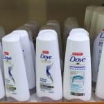 dove anti dandruff shampoo bottles on supermarket