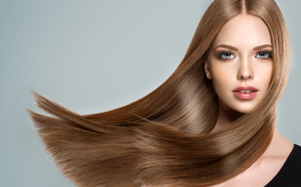 girl with shiny brown and straight long hair