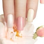 Pastel manicure with rose.