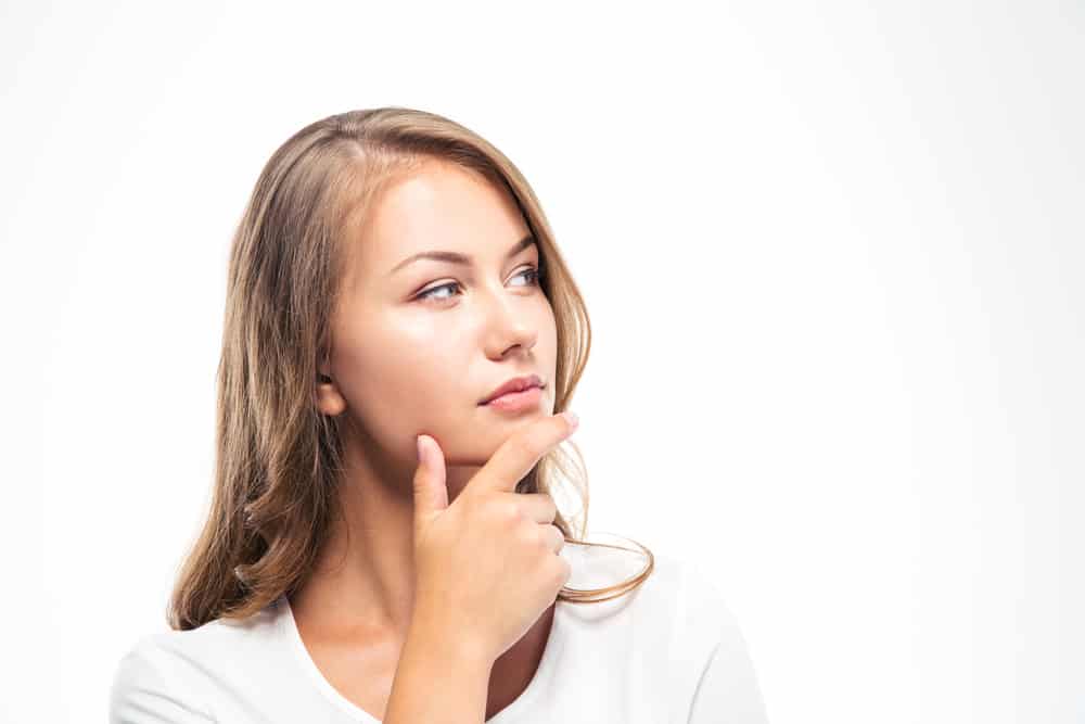 Pensive young woman looking away