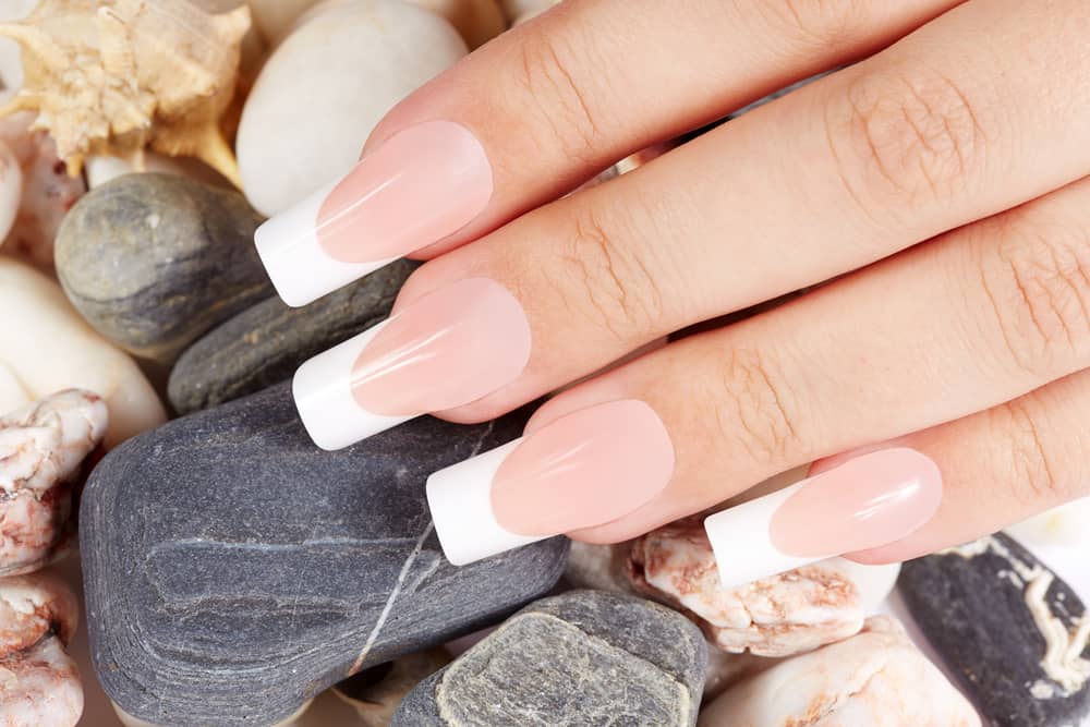 Nails with long artificial french manicure